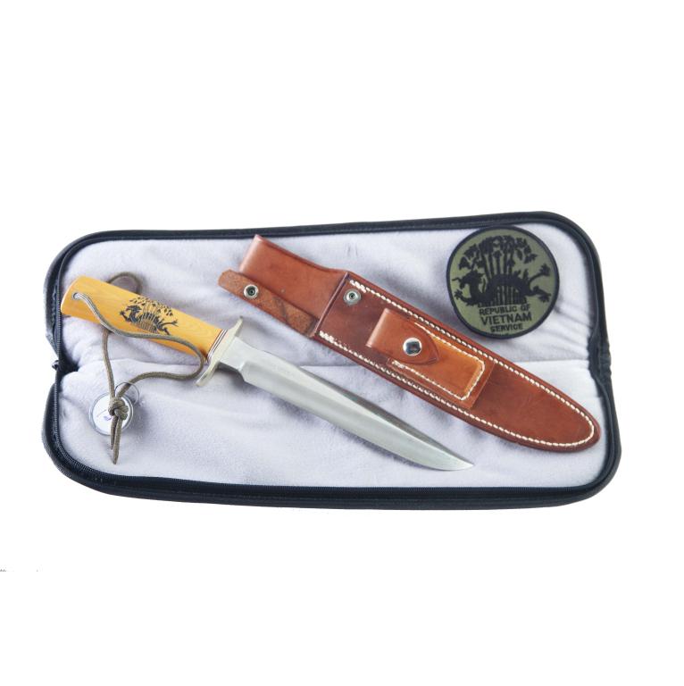 RANDALL KNIVES MODEL 1 1ST ISS VIETNAM VETERAN 8": RANDALL KNIVES MODEL 1 - 1ST ISSUE VIETNAM VETERAN 8". CA. 1987. Stainless steel blade etched VIETNAM VETERAN, double nickel silver hilt, red, white and blue spacers, and yellow Westinghouse micarta h