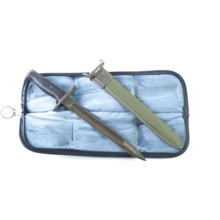 PAL MFG CO. M1 - 10" BAYONET WITH M7 SCABBARD: PAL MFG CO. M1 - 10" BAYONET WITH M7 SCABBARD. American. Black plastic grips with green fiberglass M7 scabbard. 14.5" overall length.