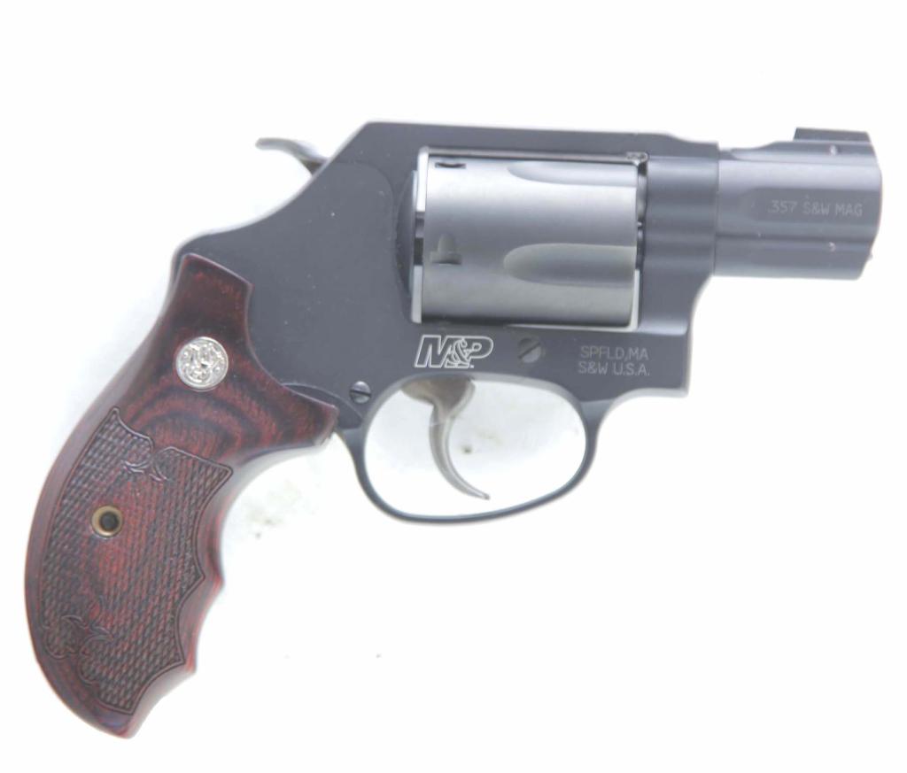 *SMITH & WESSON M&P 360 .357 MAGNUM REVOLVER: SMITH & WESSON M&P 360 .357 MAGNUM REVOLVER. American, ca. 2007. Matte black finish on Scandium/alloy J-frame, fixed night sights. 1.87" barrel, 6.5" overall. S/n DBN4749. Unfired in original case. Re