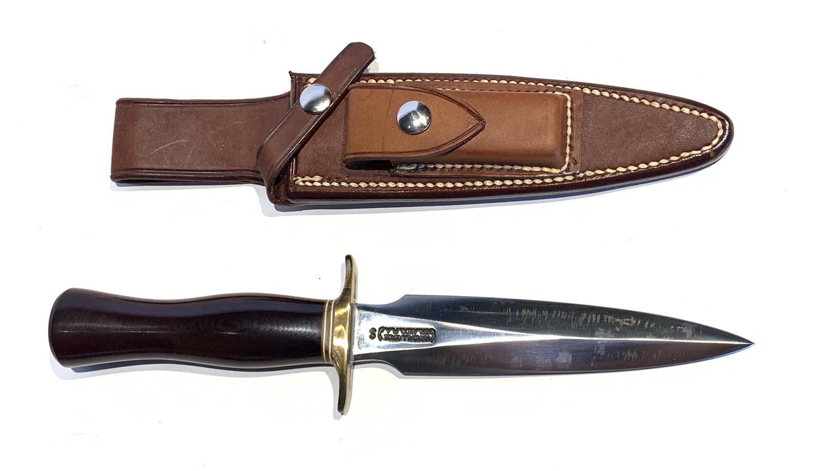 RANDALL KNIVES MODEL 2 - 6" BLADE: RANDALL KNIVES MODEL 2 - 6" BLADE. Brass double hilt, double edged, and red micarta handle. 10.75" overall length. Includes Randall Knives leather sheath.