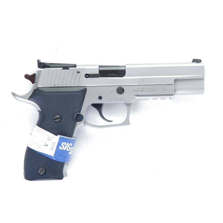 *SIG SAUER P220 .45 ACP SEMI-AUTOMATIC PISTOL: SIG SAUER P220 .45 ACP SEMI-AUTOMATIC PISTOL. American, 21st-century. Stainless steel frame and checkered, hardened rubber grips. 5" barrel length, 8.7" overall. S/n G 512 001. Unfired. Includes case 