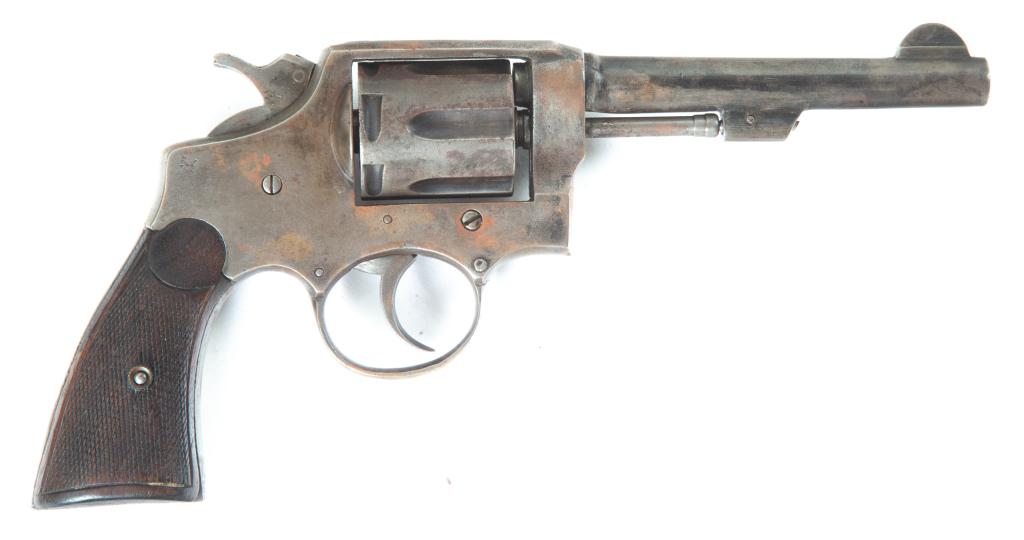 *MANUEL E500DIN EIBAR, SPAIN SIX-SHOT .32 CAL REVOLVER: MANUEL E500DIN EIBAR, SPAIN SIX-SHOT .32 CALIBER REVOLVER. Spain, 2nd quarter-20th century. Fluted swing-out cylinder, and walnut checkered grips. Barrel length 5”l. 10”l. Overall. S/n. 3085. REQU