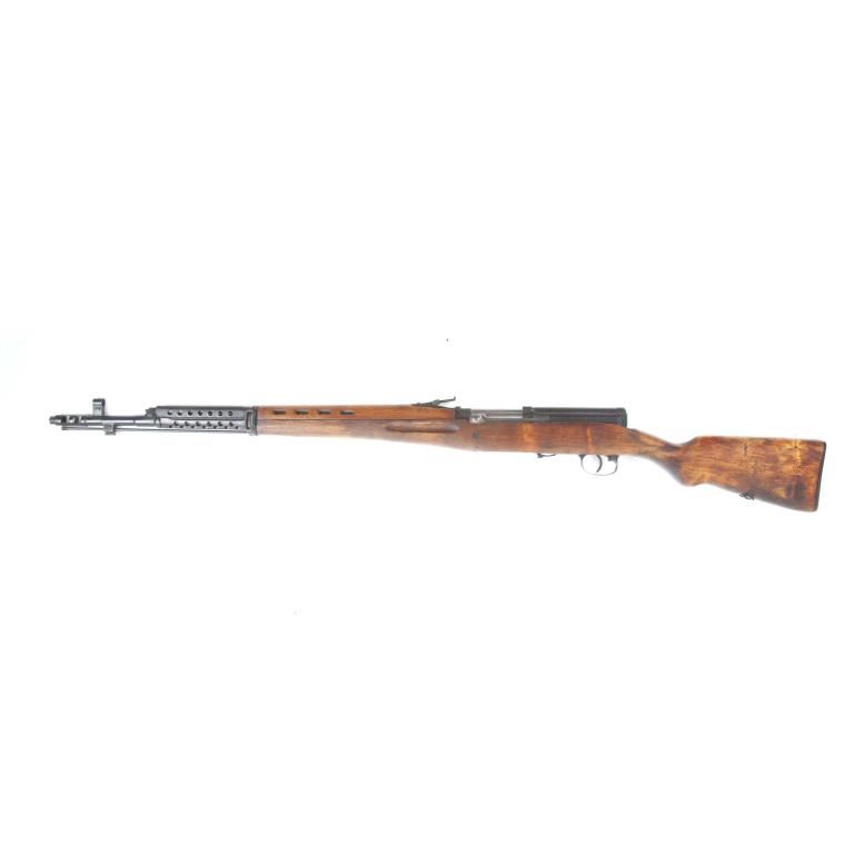 *RUSSIAN TOKAREV SVT-40 7.62MM BOLT ACTION RIFLE: RUSSIAN TOKAREV SVT-40 7.62MM BOLT ACTION RIFLE. Date stamped 1941. Walnut stock, star proof mark above chamber, cylindrical barrel, and blued frame. S/n. CY7693. Barrel length including flash suppres