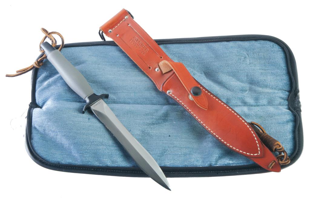GERBER KNIVES MARK II - 7" COMBAT DAGGER: GERBER KNIVES MARK II COMBAT DAGGER - 7" BLADE. American. Double serrated stainless steel blade, die cast aluminum handle, and wrist thong. 12" overall length. Includes Gerber leather sheath.