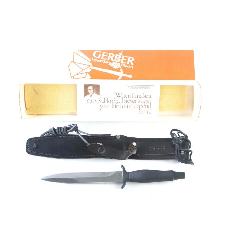 GERBER KNIVES COMMAND II - 6.75" DAGGER: GERBER KNIVES COMMAND II - 6.75" DAGGER. American. Stainless steel blade with serrations on one side, and black die cast aluminum handle. 11-7/8" overall length. S/n A7686S. Unused with original black