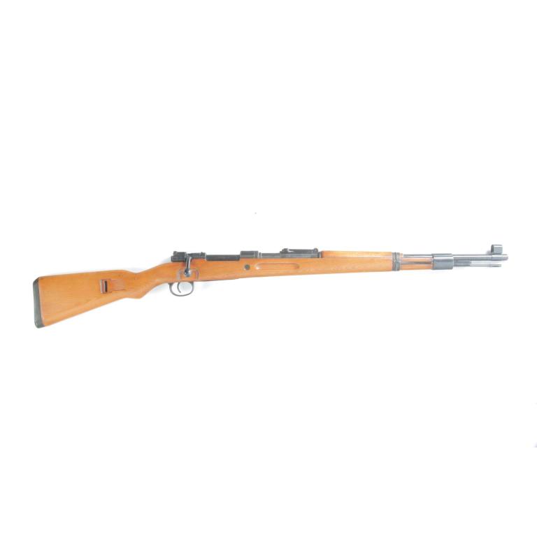 *MAUSER MODEL 98 BOLT ACTION RIFLE: MAUSER MODEL 98 BOLT ACTION RIFLE. 20th century. Walnut stock with blued barrel and bolt action, foldable rear sight. 24" barrel length, 43" overall. S/n 3320A1. Requires ATF Form 4473.