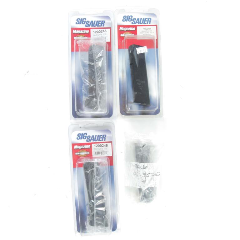 FOUR SIG SAUER 229 9MM 17 ROUND MAGAZINES: FOUR SIG SAUER 229 9MM 17 ROUND MAGAZINES. American. Unused in original packaging.