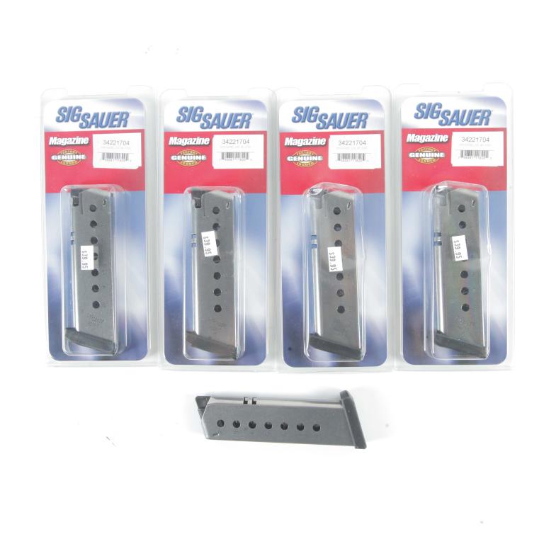 FIVE SIG SAUER 220 .45 ACP 8 ROUND MAGAZINES: FOUR SIG SAUER 220 .45 ACP 8 ROUND MAGAZINES. American. Four are unused in original packaging.