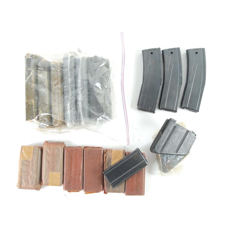 TWELVE M1 CARBINE .30 CAL MAGAZINES: TWELVE M1 CARBINE .30 CAL MAGAZINES. American. Assorted M1 Carbine magazines, some in original packaging.