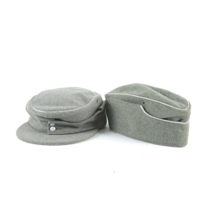 TWO WWII GERMAN ARMY HATS: TWO WWII GERMAN ARMY HATS. 2nd quarter 20th century. Wool. From Robert Lubstein. A Garrison hat, dated 1940, #58. and a Panzer Field Cap, dated 1943, #57.