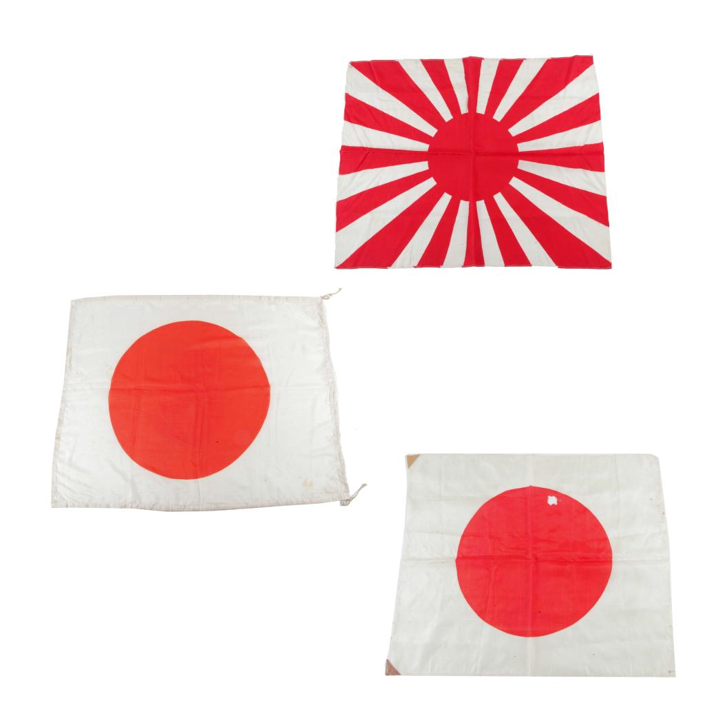 THREE WWII JAPANESE FLAGS: THREE WWII JAPANESE FLAGS. 2nd quarter 20th century. National flags with rising sun. 30"h. 38.5"w. and 23.25"h. 26.75"w. and rising sun with rays battle flag, 21.25"h. 25.5"w.