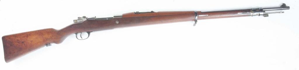 *MAUSER "MODELO ARGENTINO 1909" 8MM BOLT ACTION RIFLE: MAUSER "MODELO ARGENTINO, 1909” 8MM BOLT ACTION RIFLE. Germany, 1st quarter-20th century. Walnut stock, nickeled chamber and bolt, blued trigger and barrel, and chamber marked with manufacturer deta