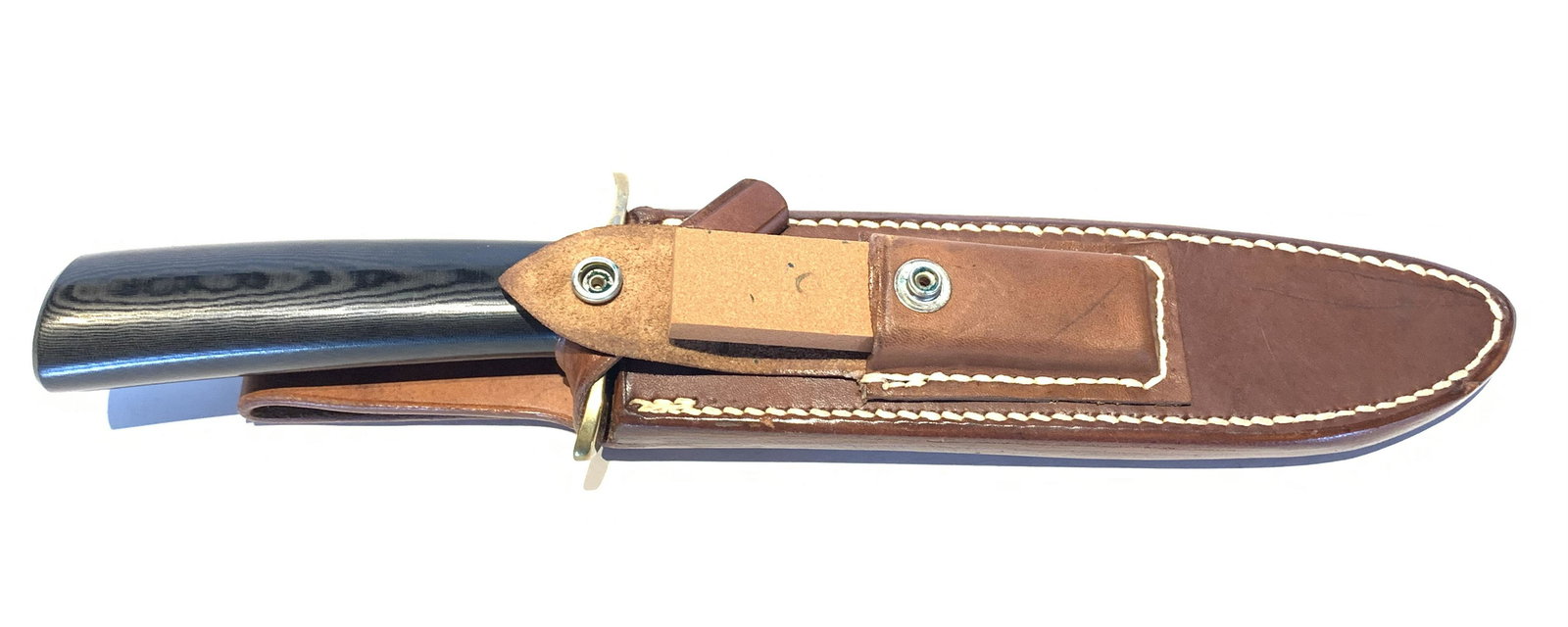 RANDALL KNIVES MODEL 1 - 7" BLADE: RANDALL KNIVES MODEL 1 - 7" BLADE. Black micarta handle, brass double hilt, and top cutting edge sharpened approximately 3". 11.75" overall. Includes Randall Knives leather sheath.