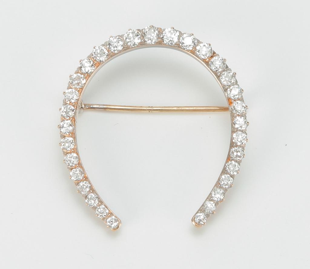 VINTAGE DIAMOND HORSESHOE BROOCH. (1 of 2)