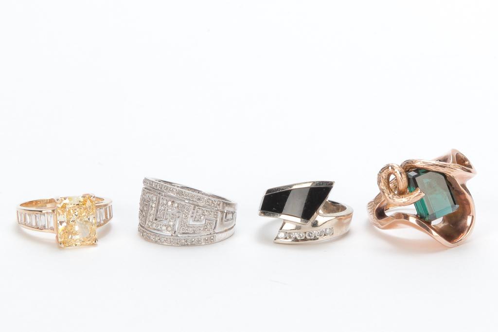 FOUR LADIES 14 KARAT GOLD GEM-SET RINGS. (1 of 1)