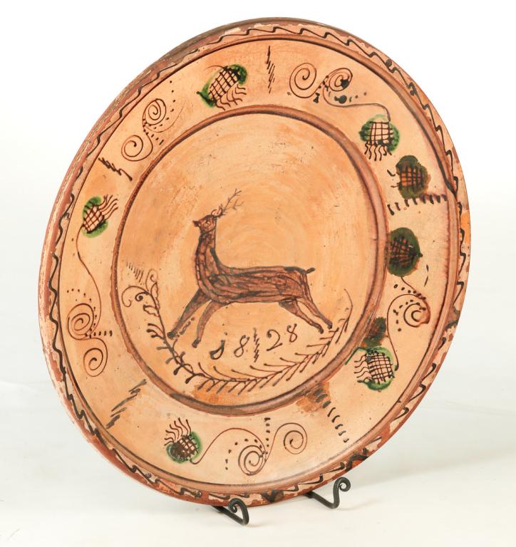 AMERICAN REDWARE CHARGER WITH STAG. (1 of 2)