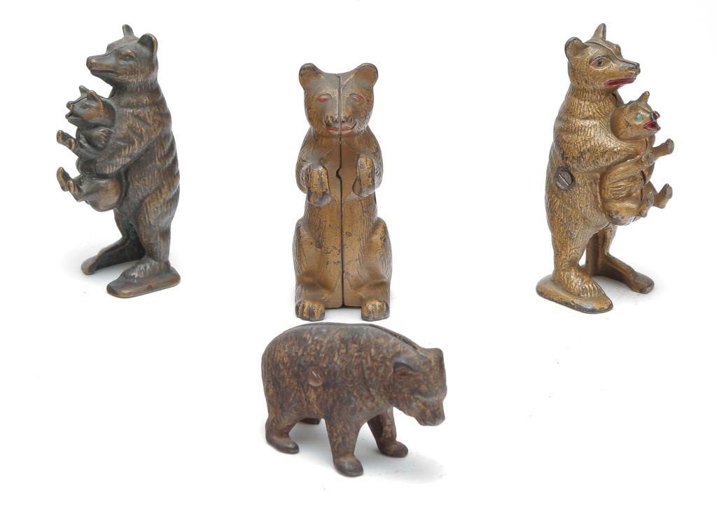 FOUR BEAR-THEMED STILL BANKS. (1 of 3)
