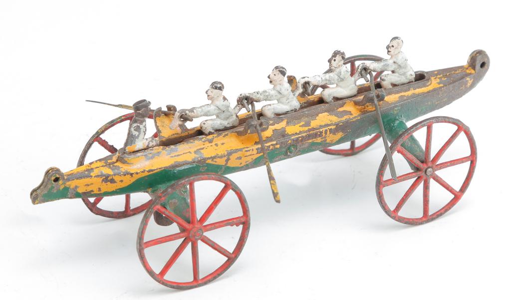 CAST IRON ROWING TEAM PULL TOY. (1 of 3)