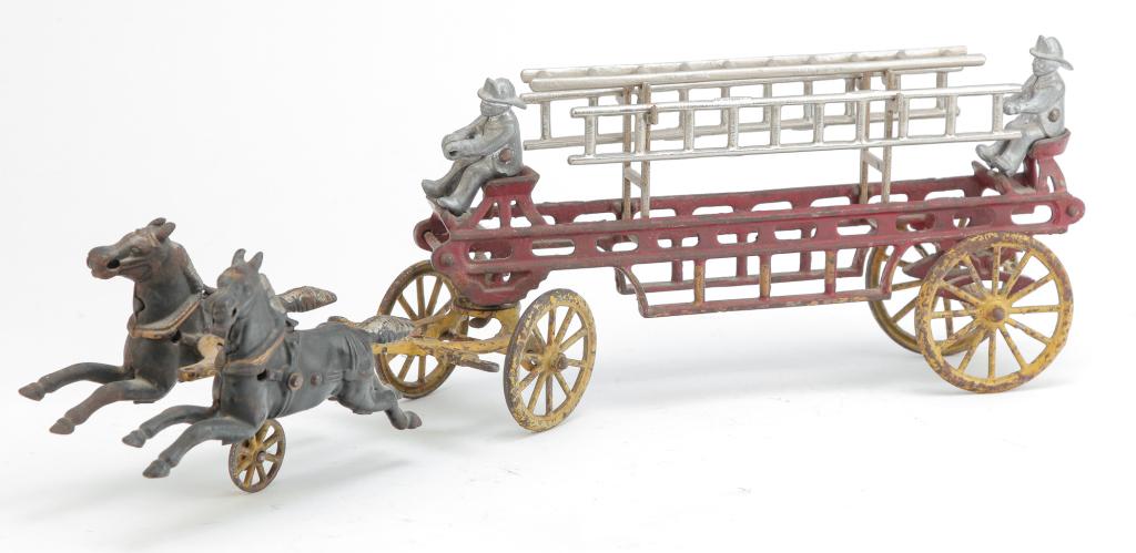 CAST IRON LADDER WAGON TOY. (1 of 4)