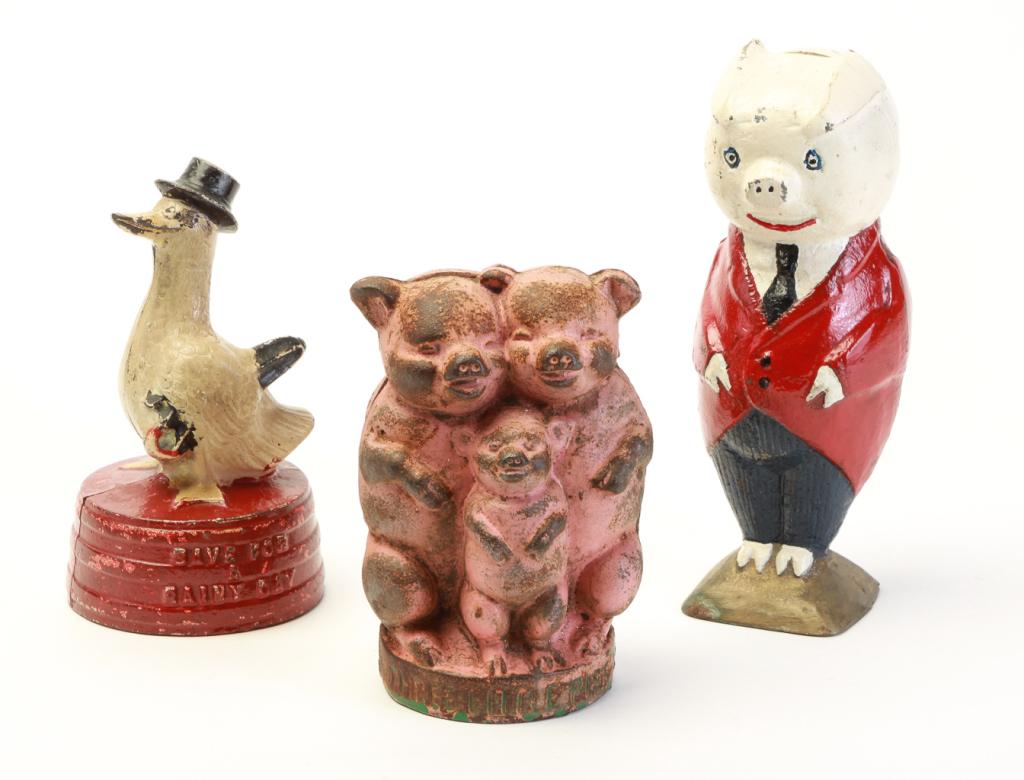 THREE CAST IRON STILL BANKS. (1 of 3)