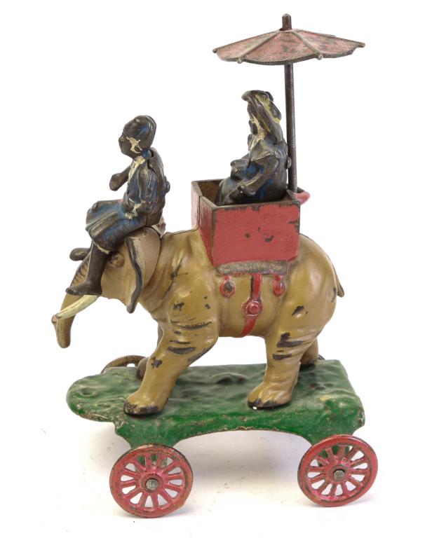 KENTON CAST IRON ELEPHANT WITH LADY PULL TOY (1 of 5)