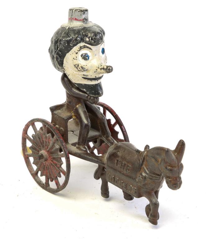 KENTON HAPPY HOOLIGAN CAST IRON NODDER TOY (1 of 5)