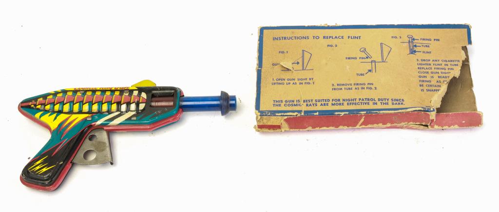 RANGER STEEL PRODUCTS COSMIC RAY GUN WITH BOX: American, 2nd quarter-20th century. Lithographed tin ray gun with plastic barrel. Includes original box.