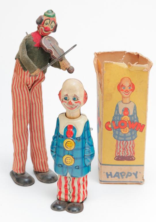 TWO TIN LITHO WIND-UP CLOWNS (1 of 4)