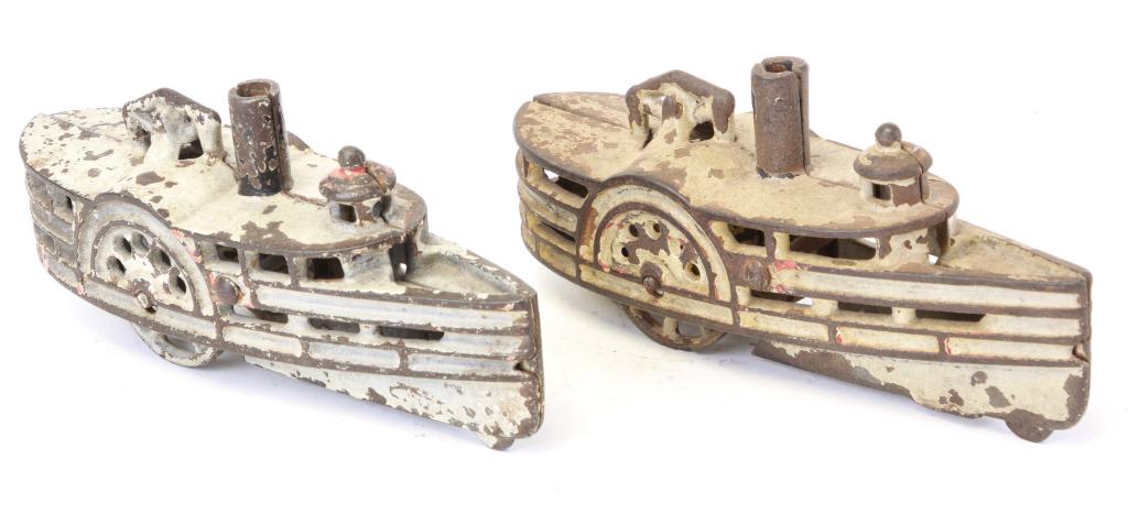 TWO CAST IRON PADDLE WHEEL BOAT TOYS (1 of 3)