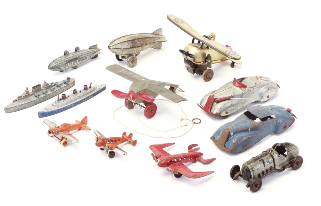 TWELVE AMERICAN PLANE, SHIP AND AUTO TOYS. (1 of 3)