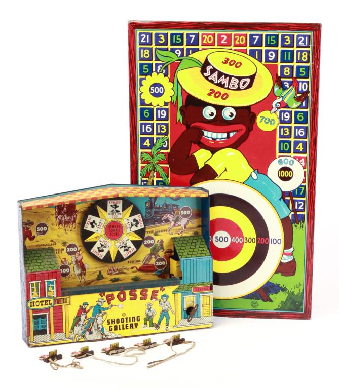 TWO AMERICAN TARGET GAMES BY "WYANDOTTE".: Mid 20th century, lithographed tin. "Sambo" target board, 23"h. 14"w. And "Posse" wind up game. Wear, non working. 10.5"h. 14.25"w.