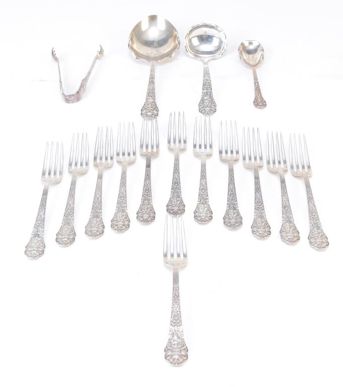 SIXTEEN PIECES MEDICI PATTERN STERLING FLATWARE.: American, ca. 1880. Old pattern with twelve luncheon forks, berry spoon, ladle, tongs, and sauce spoon. Monogrammed. Approx. 26 ozt.