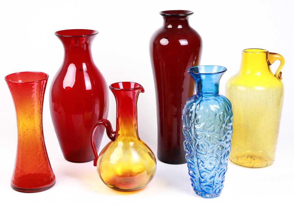 SIX LARGE PIECES OF AMERICAN BLENKO GLASS.: Second half 20th century. Dark red slender vase, 25"h., dark red classical shape, 21.5"h., light amber crackle with applied handle, 19"h., light blue with embossed irregular pattern, 18.5"h., crackle 