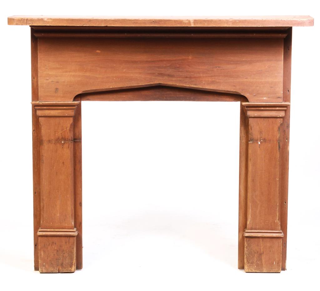 AMERICAN GREEK REVIVAL MANTEL.: Second quarter 19th century, poplar. Deep shelf, apron with pointed arch and flat pilasters with camfered corners. 47"h. 52.5"w. 8.5"d.