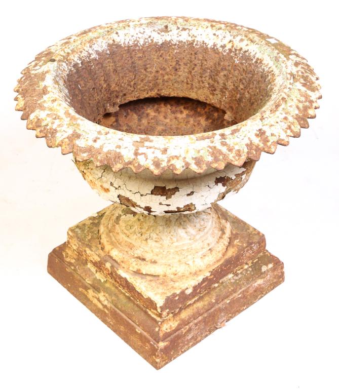 OHIO "KRAMER" CAST IRON URN.: Dayton, ca. 1900. Nicely cast two piece with decorative rim, ribbed bowl, fluted stem and square foot. Case on base "Mfg. by the the Kramer Bros. Fdy. Co. Dayton, Ohio. 19"h. 21.5"d.