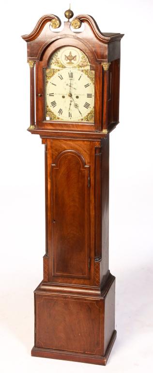 ENGLISH TALL CASE CLOCK.: First quarter 19th century, mahogany with pine secondary, satinwood string inlay. Bonnet with broken arch pediment, brass rosettes and finial, reeded columns with brass Corinthian capitals, door with 