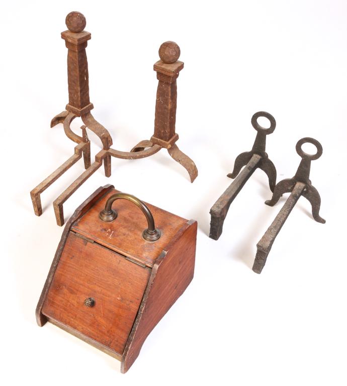 AMERICAN COAL HOD AND TWO PAIR OF ANDIRONS.: Mid 19th century cast iron andirons with ring tops, hearts and splay legs, 14"h. and Arts and Crafts cast iron andirons with hand hammered finials and legs, 22"h. Together with a mahogany hod wtih bra