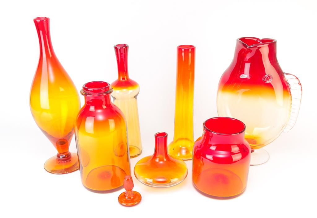 SEVEN PIECES OF AMERICAN BLENKO AMBERINA.: Second half 20th century. Footed fish vase, 13.5., footed vase, 16"h., tall slender decanter, 14.25h., stick vase, 13"h., jar with applied ring around neck, 11"h., wide mouthed jar, 7"h. and a low bul
