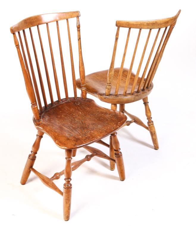 PAIR OF AMERICAN FAN BACK WINDSOR SIDE CHAIRS.: Ca. 1800, oak and pine. Turned stiles, legs and "H" stretcher, spindle back and saddle seats. 17" seat, 35.5"h. Ex Tom Brown.