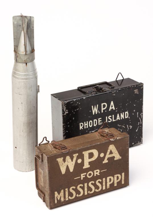 THREE AMERICAN WPA RELATED PIECES.: Ca. 1930s. Two painted tin medical kits. Black with white lettering "WPA, Rhode Island", 2.5"h. 9"w., 6.5"d. and olive drab with white lettering "WPA for Mississippi", 2.5"h. 7.75"w. 5"d. And a painte
