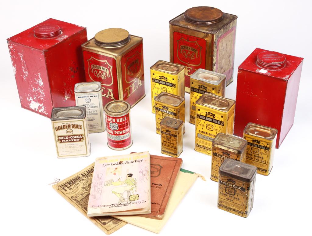 FIFTEEN AMERICAN "GOLDEN RULE" STORE TINS.: Columbus, Ohio, 1st half 20th century. Four tea, 9.5" to 11.5"h., black and white pepper, mustard, 6.5"h. ginger, allspice, cream of tartar, sage, 4.75"h., baking powder, whole nutmeg, 4"h., "Milk Coc