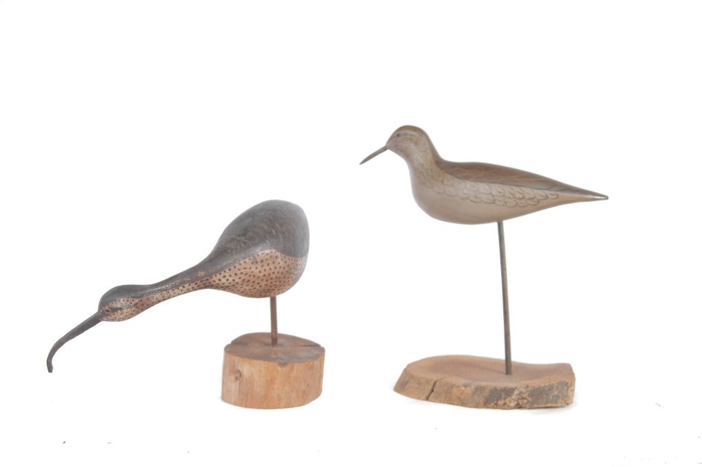 FIVE BIRD CARVINGS.: American, 2nd half 20th century. Two carved shorebirds, both signed. (Charles) Moore, 12"h. And "Oroutt", 9"h. including bases, carved box in the form of a duck with original paint and lift lid. 12.5"