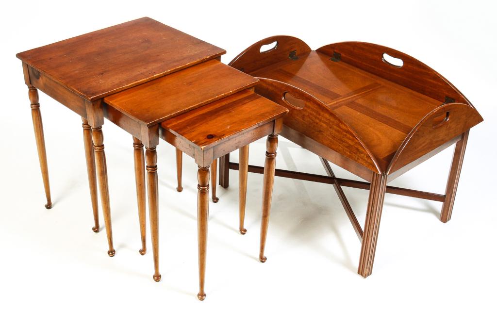 TWO PIECES OF AMERICAN FURNITURE.: Second half 20th century. "Pine Shop" Queen Anne style nesting tables with turned legs, pad feet and branded mark on smallest. Largest is 24"h. 21"w. 17"d. And a Chippendale style mahogany butler's tr
