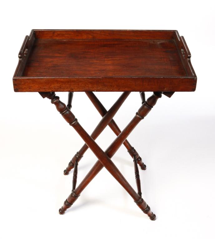 ENGLISH GEORGE VI BUTLER'S TRAY.: First half 19th century, mahogany. Dovetailed tray with hand holds on both ends and base with turned legs and stretchers. 33"h. 26.5"w. 18.75"d.
