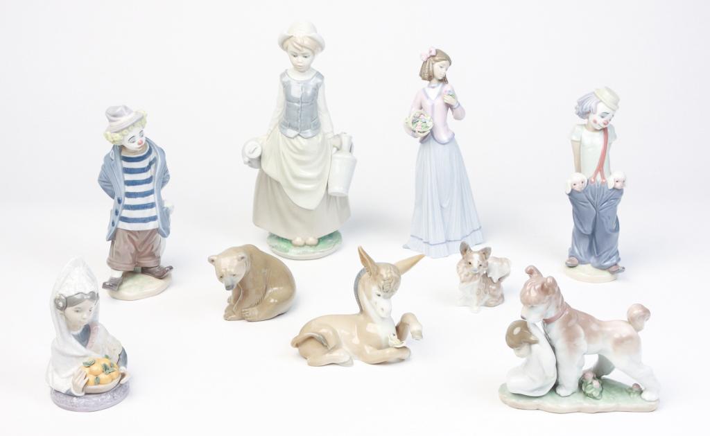 NINE SPANISH LLADRO FIGURINES.: Late 20th and 21st centuries. Four Collectors Society: two clowns, 8.5"h. and 9"h.; girl with flowers, 10"h.; dog with girl, 5.75"h. With girl with milk pails, 11.25"h. Bust of veiled lady, 5.5"h. Don