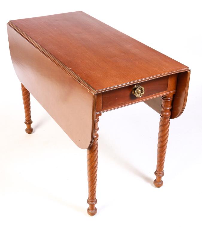AMERICAN SHERATON DROP LEAF TABLE.: Second quarter 19th century, cherry with pine secondary. Top and rounded leaves have beaded edge, dovetailed drawer with brass pull and rope turned legs. 30"h. 42"w. with 44.25" with 12.5" leaves.