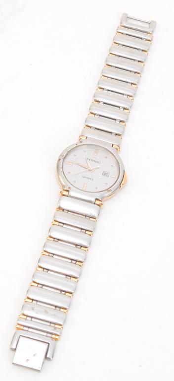 LADIES STAINLESS 2-TONE MOVADO WRISTWATCH.: Swiss, late 20th - early 21st century. Stainless Movado wristwatch, quartz movement, date, 30mm, approx. 7.5"l, back stamped "88-32-881 V67". Some wear, commensurate with age.