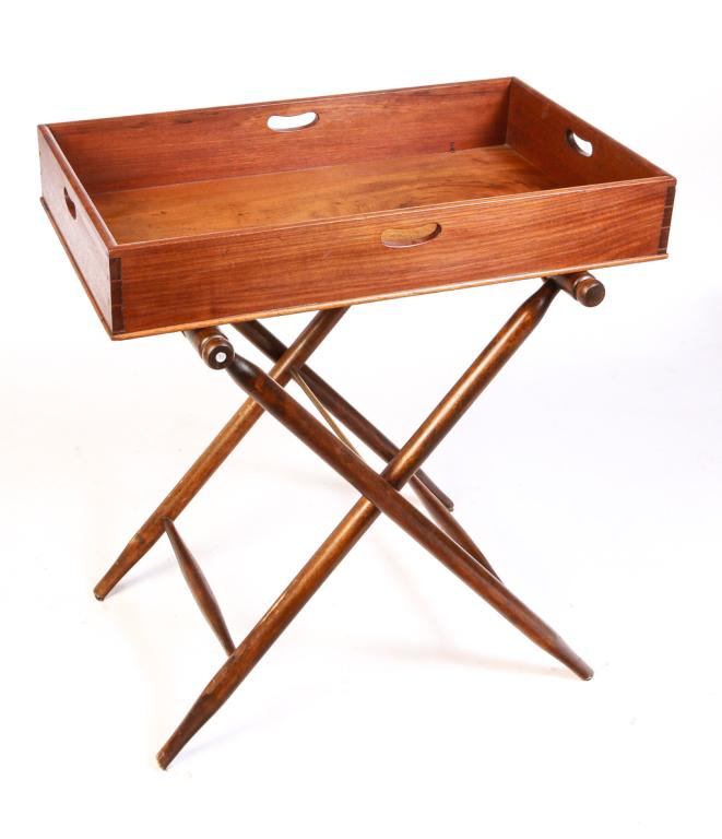 ENGLISH BUTLER'S TRAY AND STAND.: Mid 19th century, mahogany. Dovetailed tray with cut out handles, stand with turned legs and stretchers. 32"h. 29.75"w. 20.5"d.