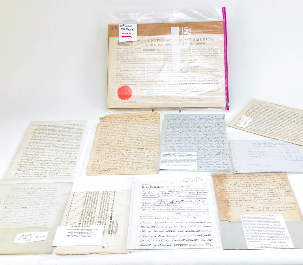 GROUP OF EPHEMERA.: American and European, 19th-20th century. Mostly pen and ink with a few printed indentures and deeds. Includes 1841 house purchase in Elmira, New York, 1812 Edinburgh indenture, 1822 Shenandoah land d