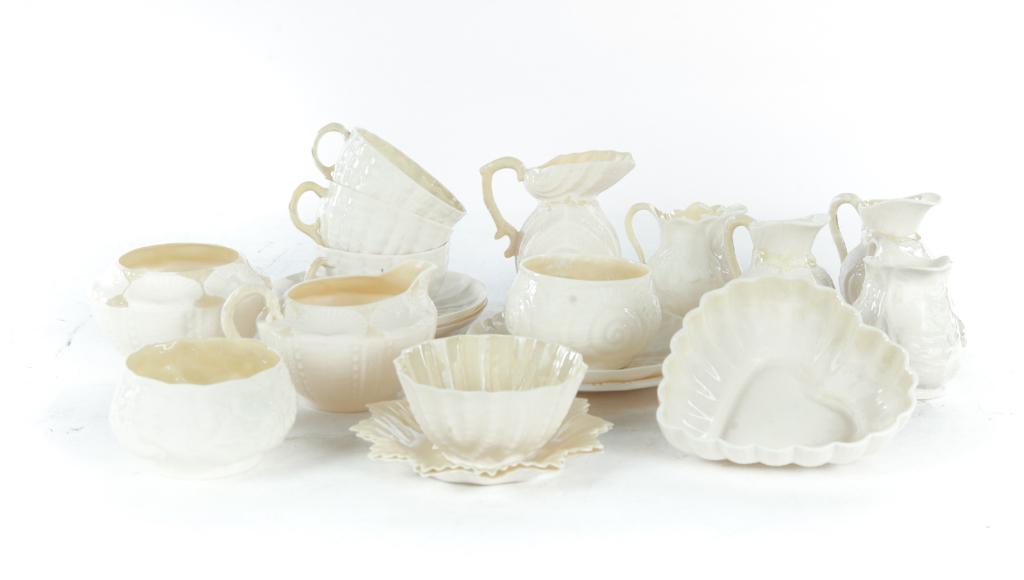 GROUP OF BELLEEK CHINA.: Ireland, 20th century. "Toy Shell" creamer and sugar, "Lotus" creamer and sugar, "Echinus" creamer and sugar, "Toy Shell" creamer, "Double Shell" creamer, "Lotus" creamer, three cups and saucers, hear